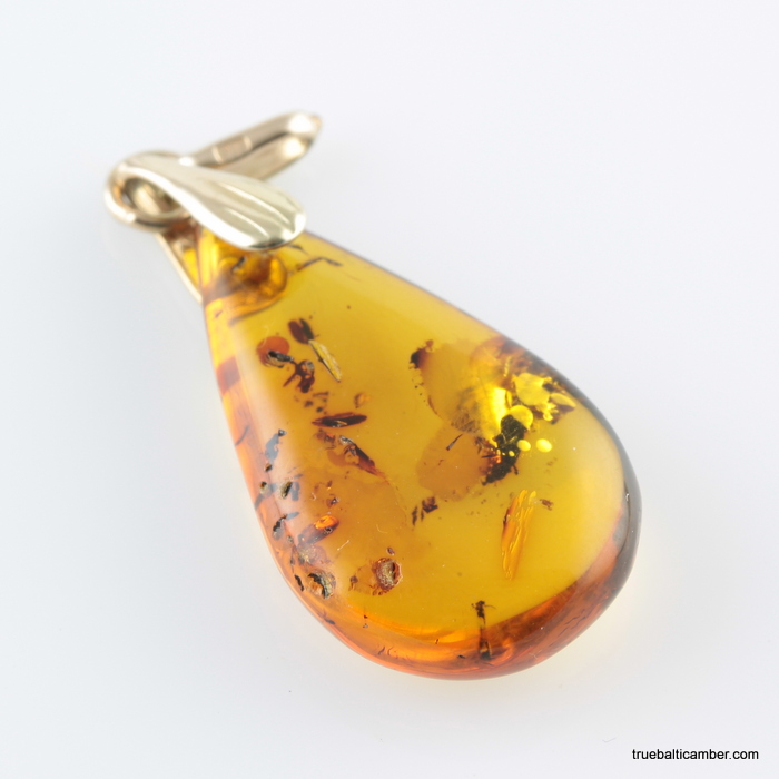 Baltic amber resin drop with cracks